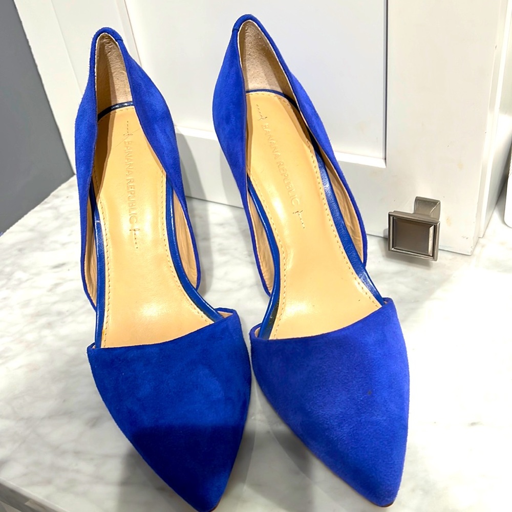 Royal blue suede heels .